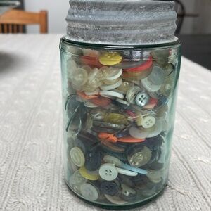 Antique Ball blue canning jar filled with assorted buttons zinc screw on lid.